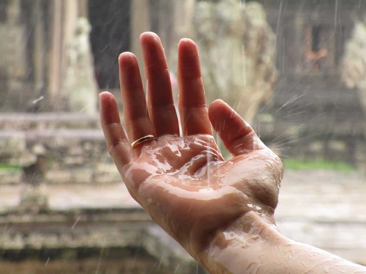 rainy wedding hand