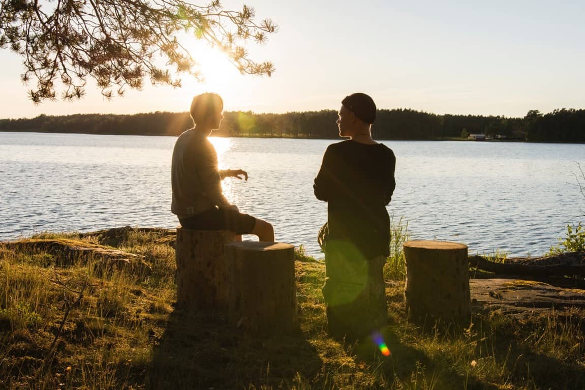 two friends discussing