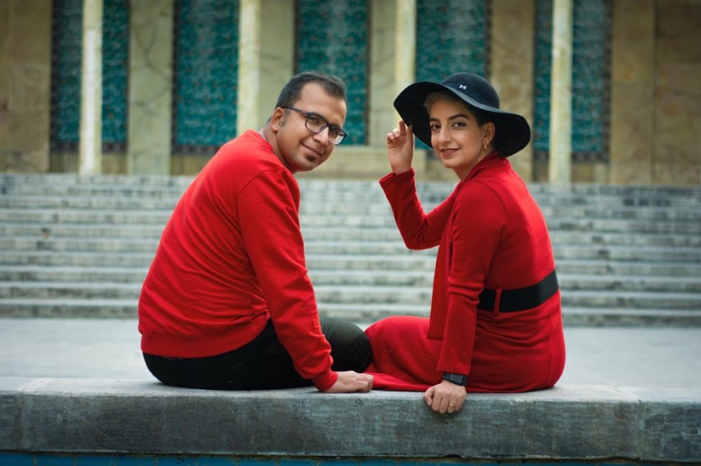 man and woman in matching clothes