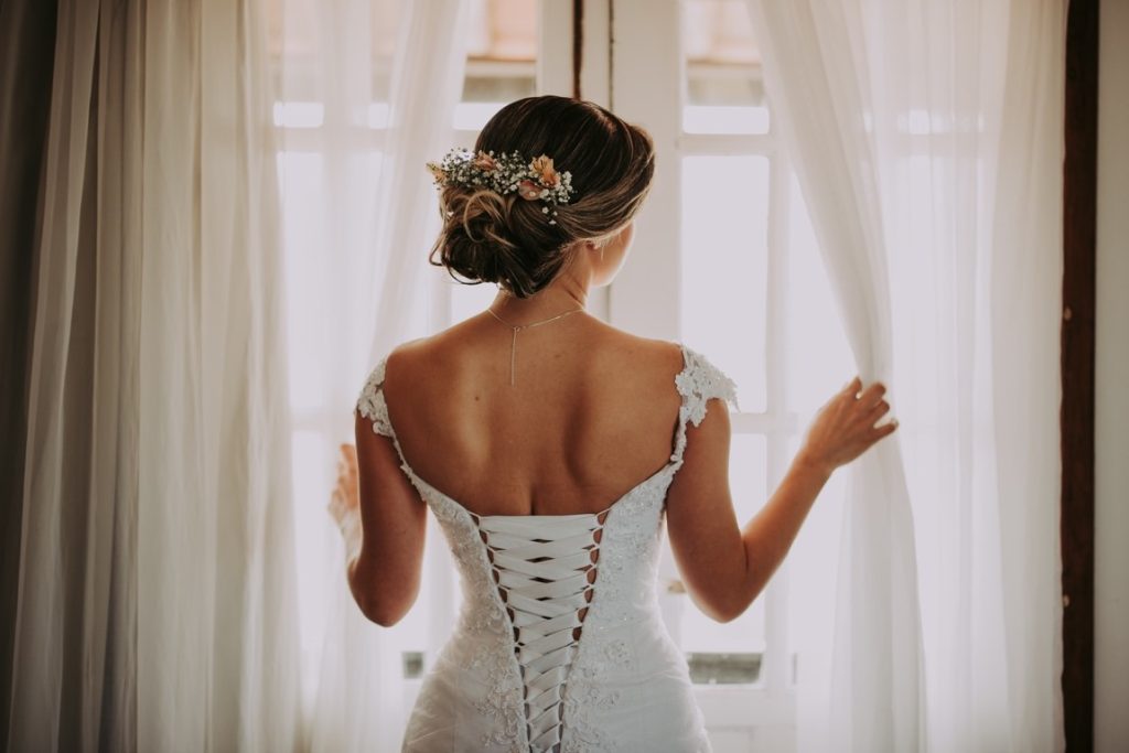 bride looking out a window