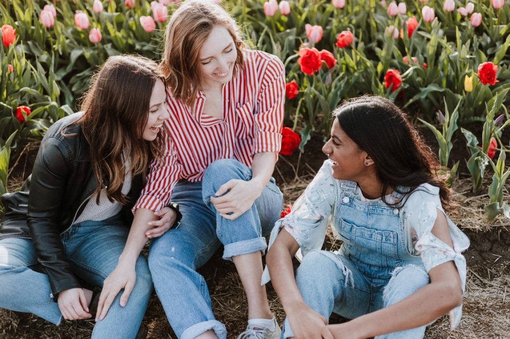 three woman laughing