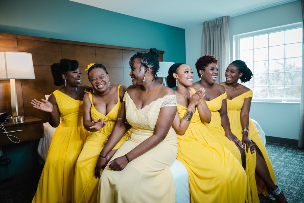 bride and bridesmaid in yellow dresses