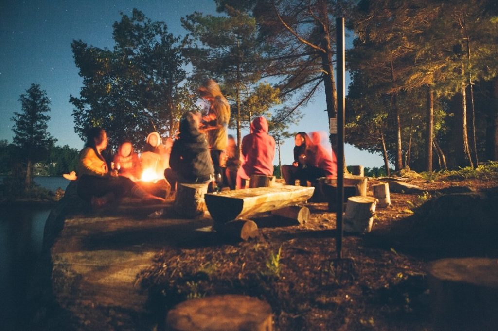 friends camping in the woods