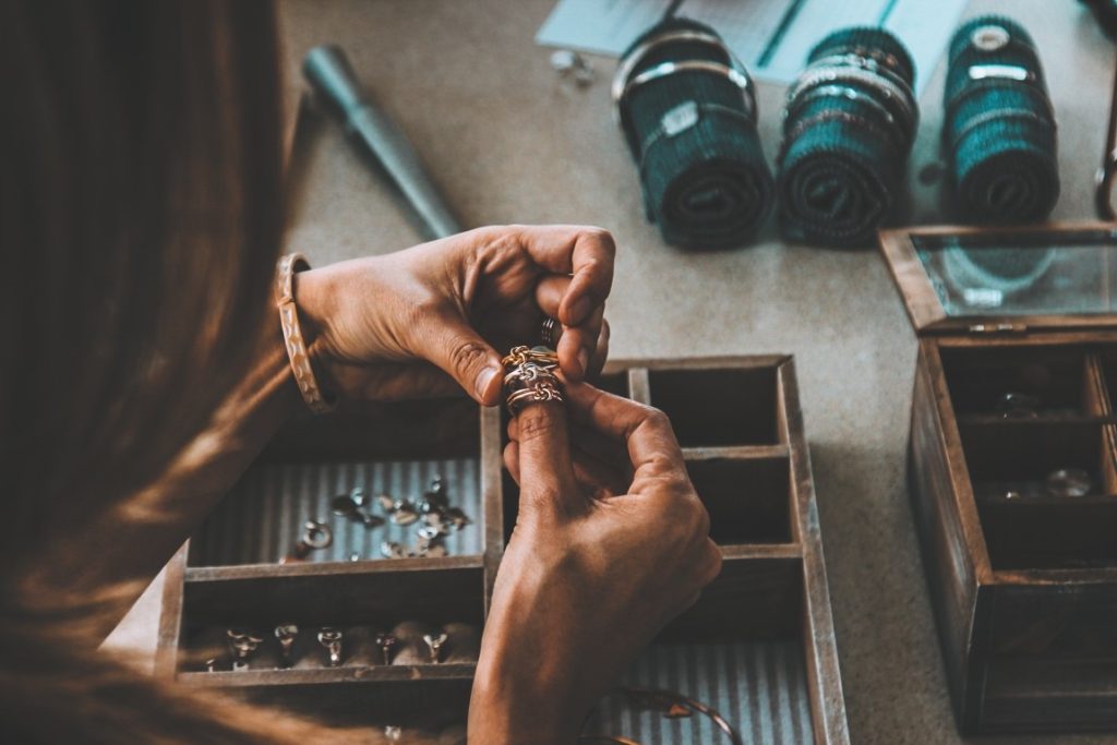 jeweler examining her rings