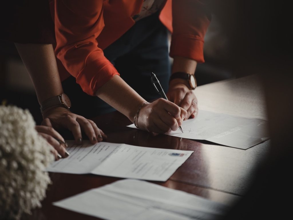 man filling out a form