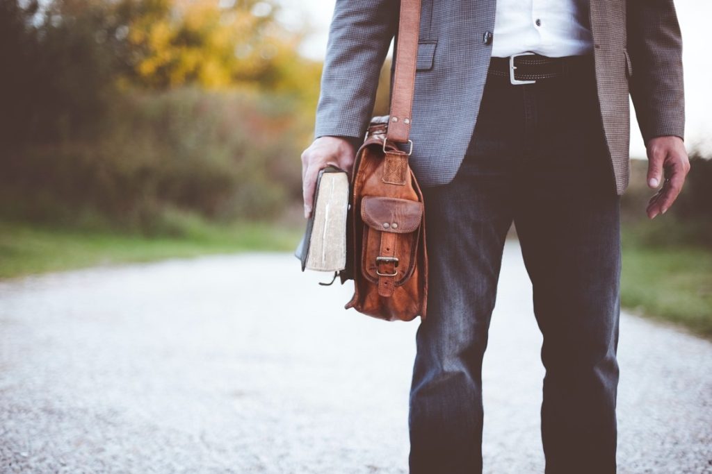 man holding a book