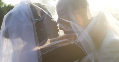 newlyweds kissing