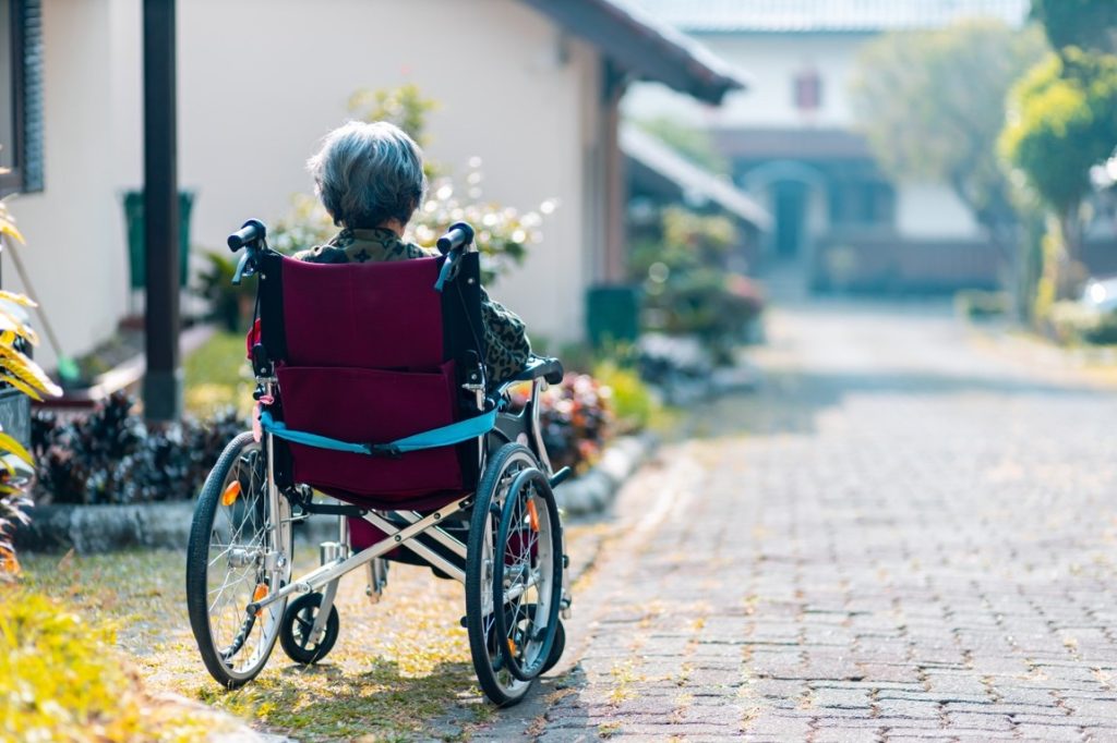 old woman in a wheelchair