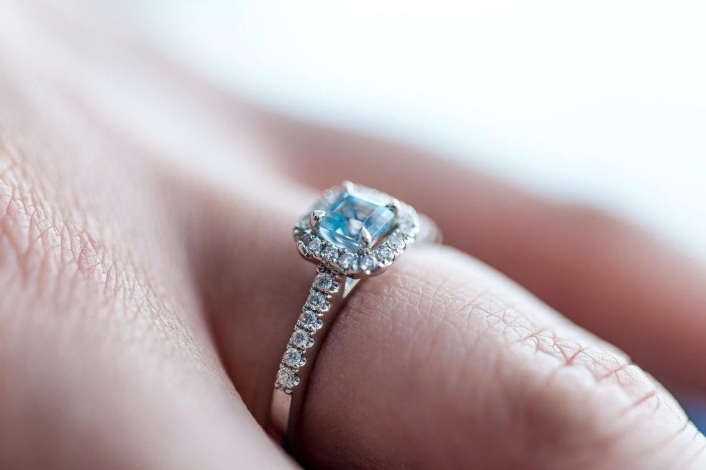 wedding ring with blue diamond