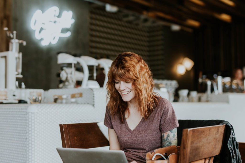 woman sitting on a cafe