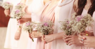 bridesmaid holding bouquet
