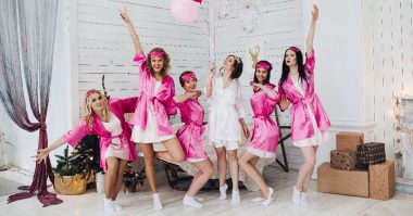 bridesmaids and bride having fun at bridal shower