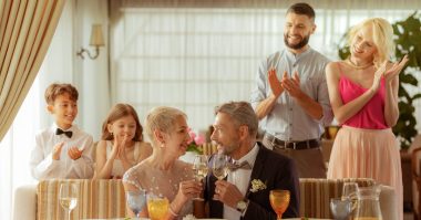 children and grandchildren clapping at a wedding