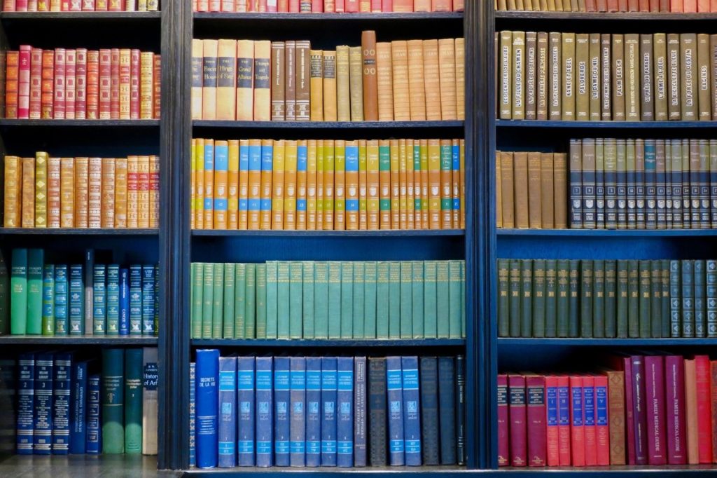 color-coded bookshelf