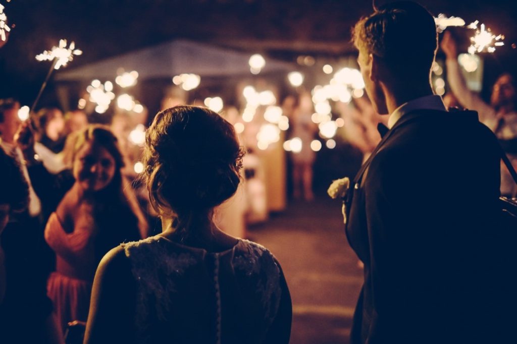 guest holding fireworks