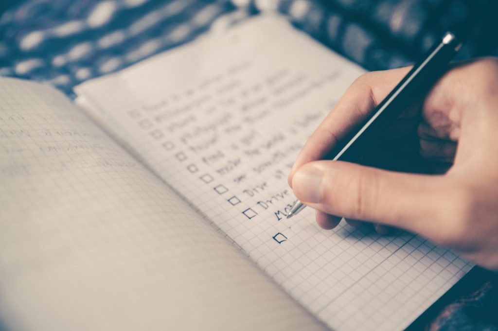 making checklist on notebook