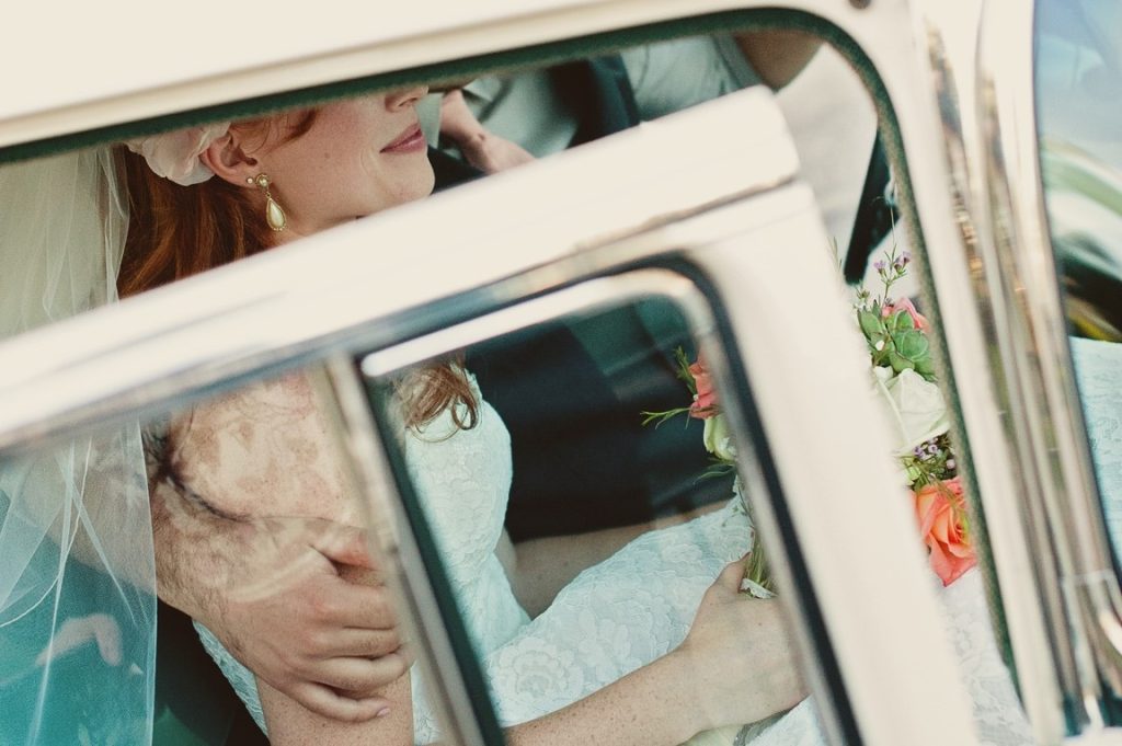 newlywed in a vintage car