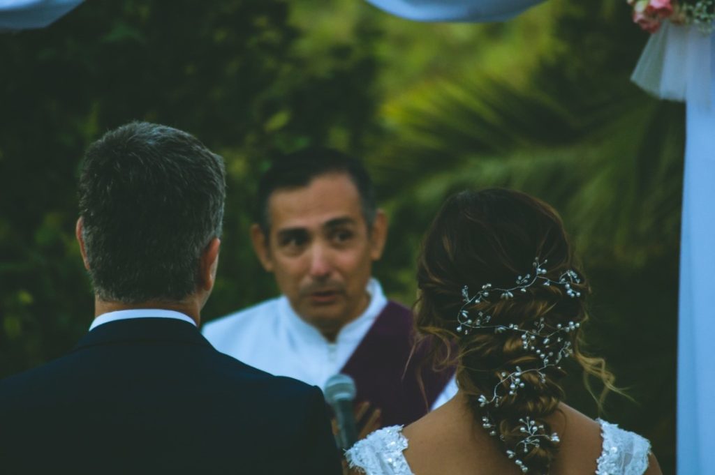 wedding officiant and newlyweds