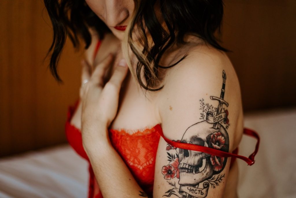 boudoir photo of a tattooed woman