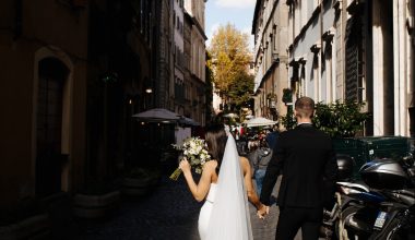 bride and groom walking on the streets