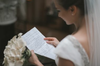 bride reading wedding vow