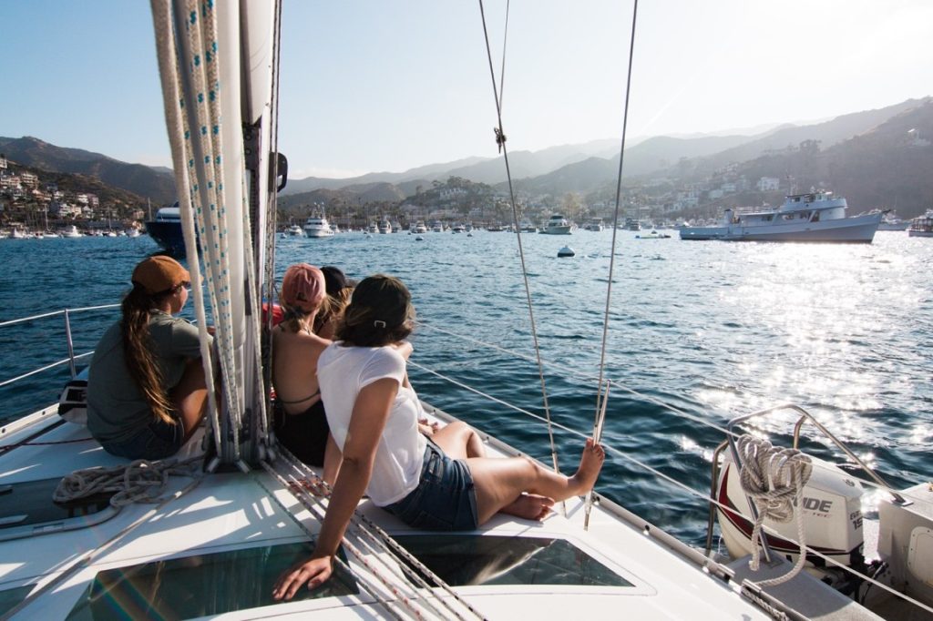 friends hanging out on a boat