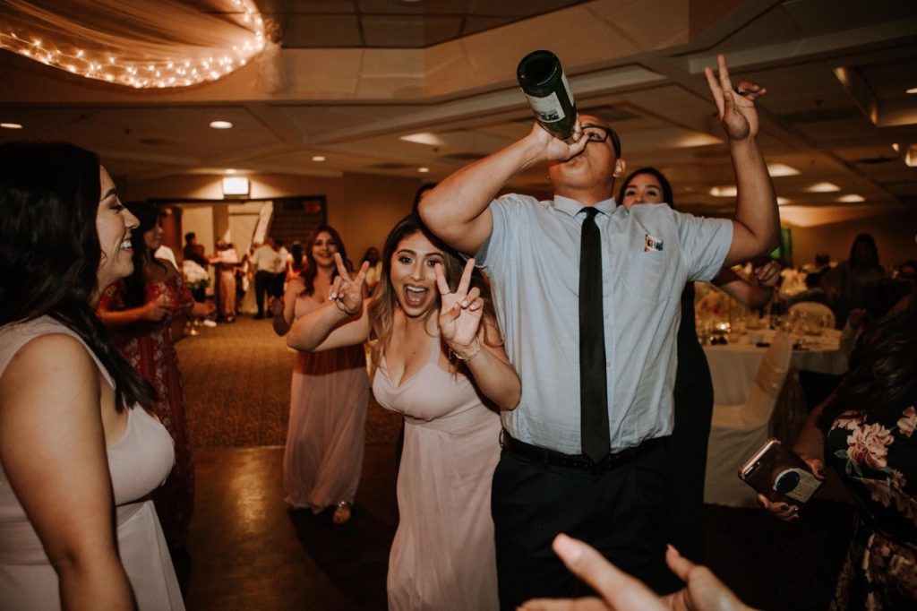 friends having fun at wedding reception