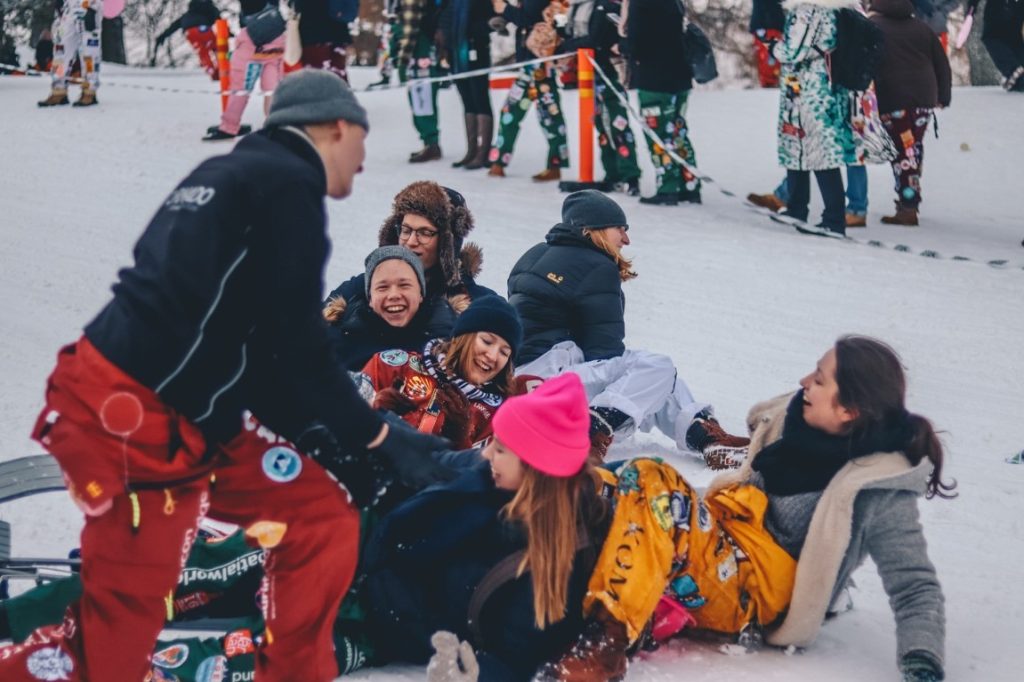 friends having fun in the snow