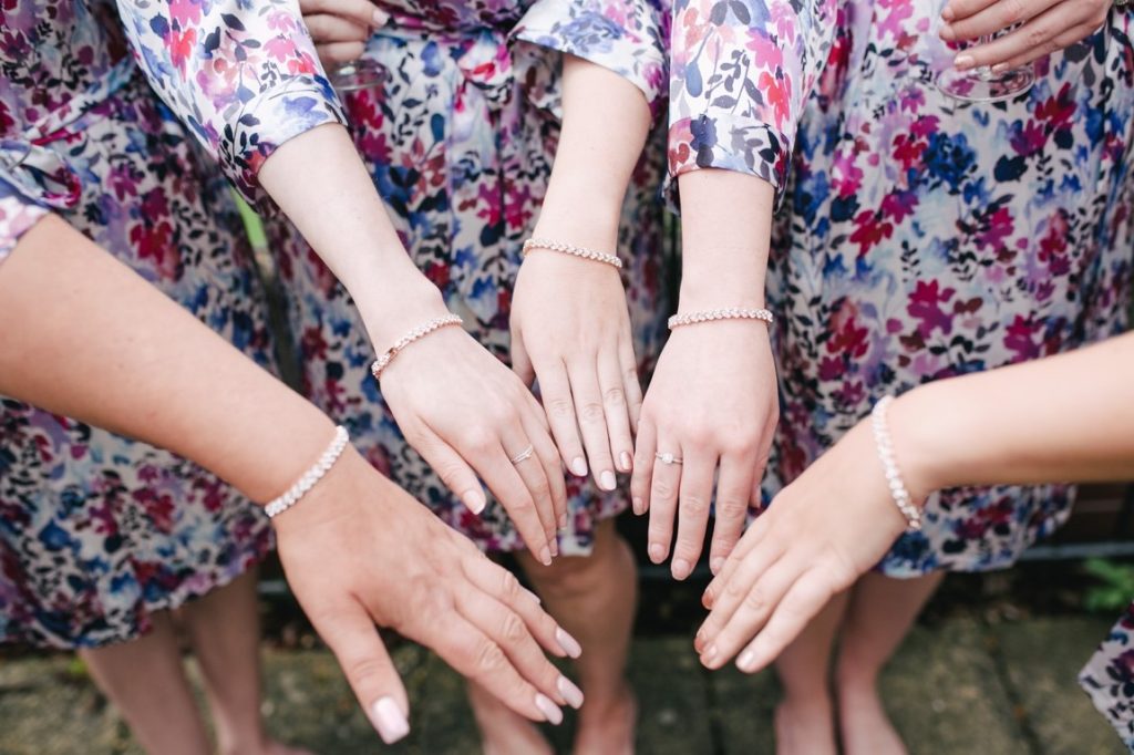 friends with matching clothes and bracelets