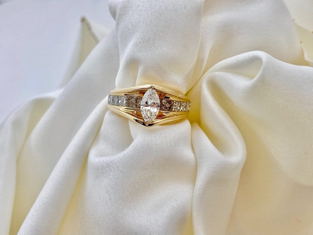 gold ring with huge diamond
