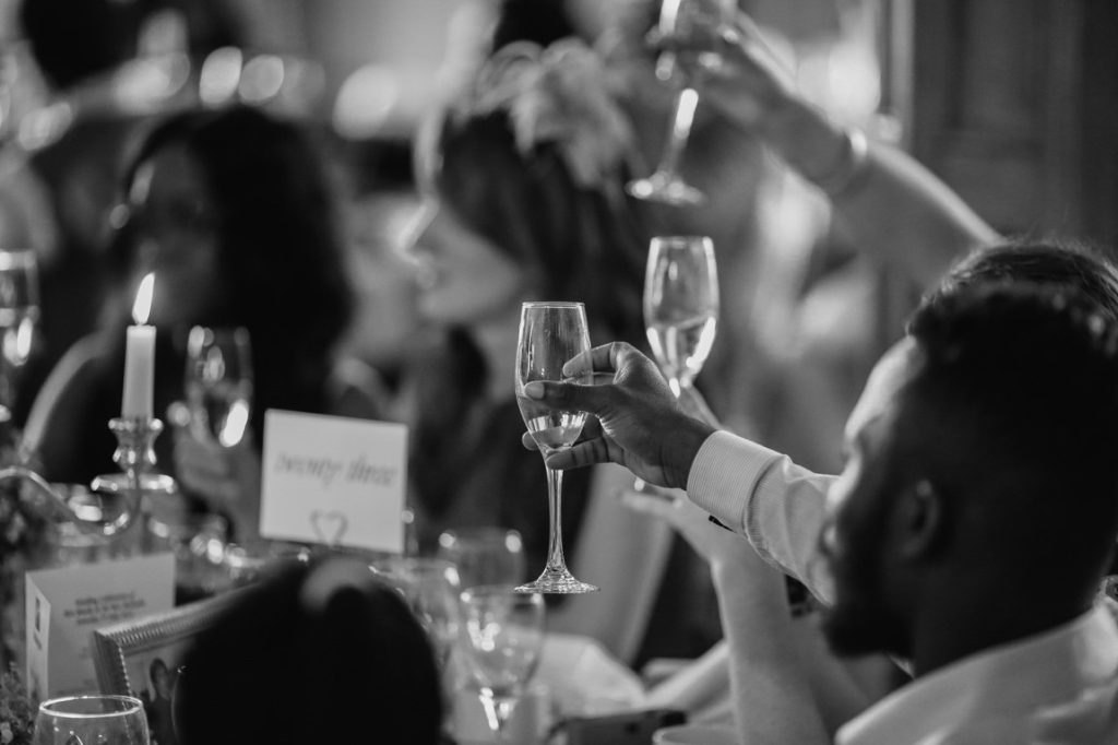 guests raising their glasses