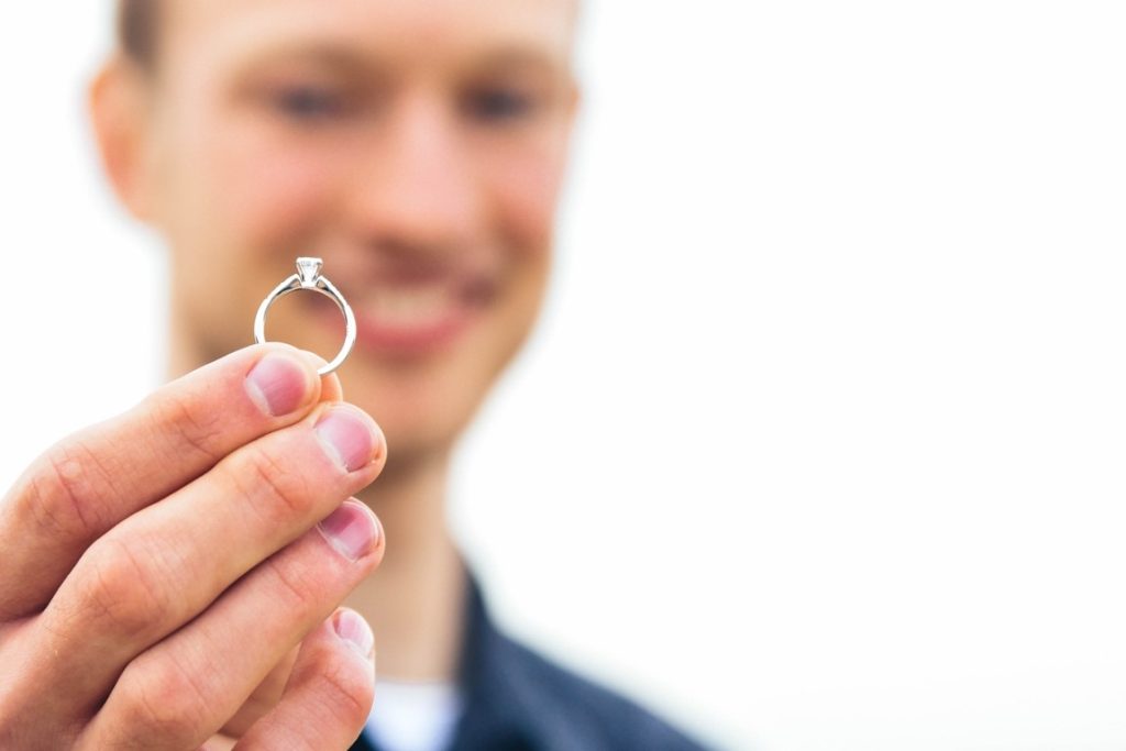 man holding a ring