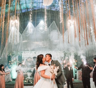 newlyweds kissing