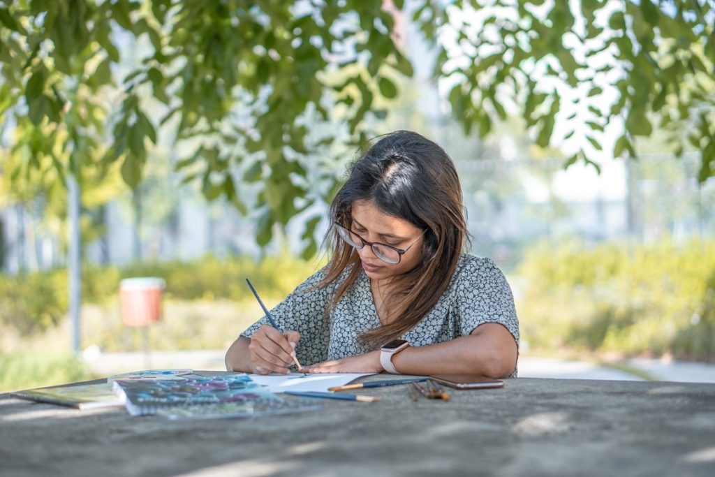 woman painting outdoors