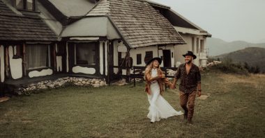 couple on a ranch in western mountains