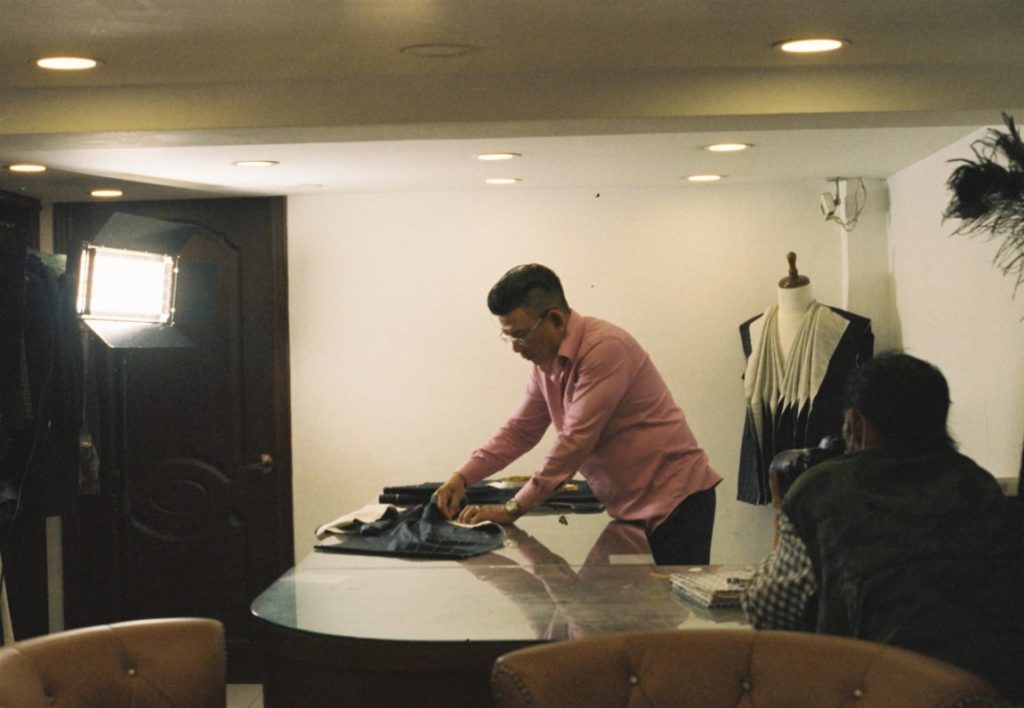 male seamstress working