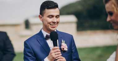 man speaking at a wedding