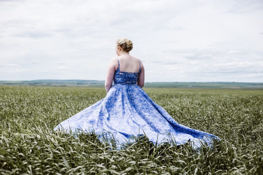 woman wearing blue dress