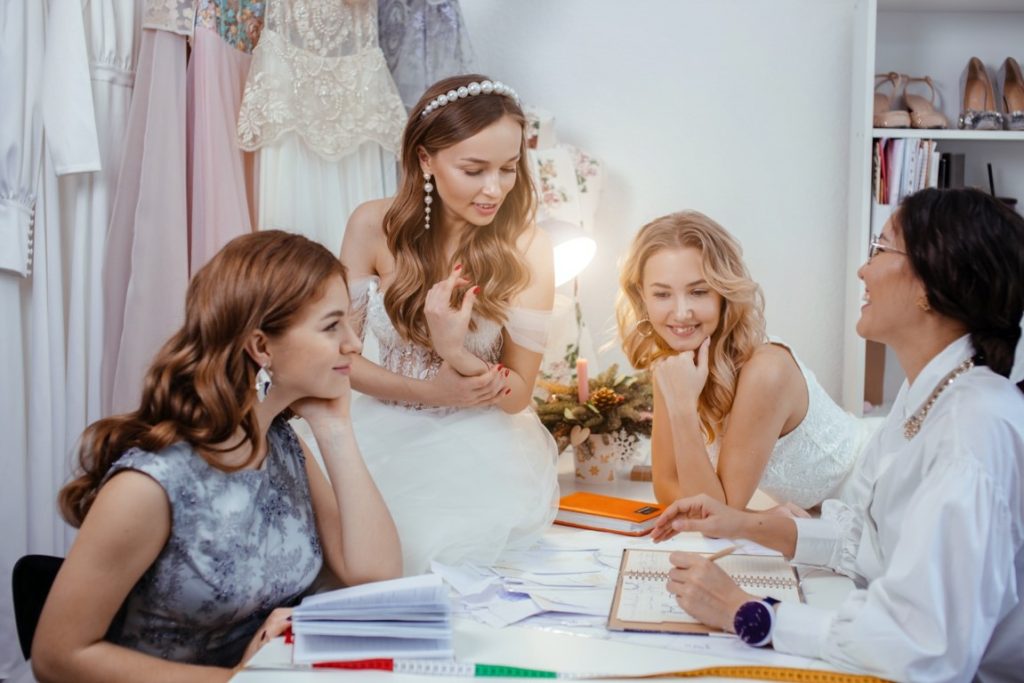 women planning wedding dress