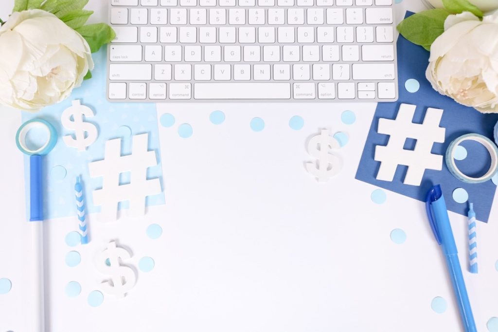 laptop keyboard and hashtag signs