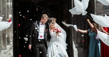 bride and groom going out of church
