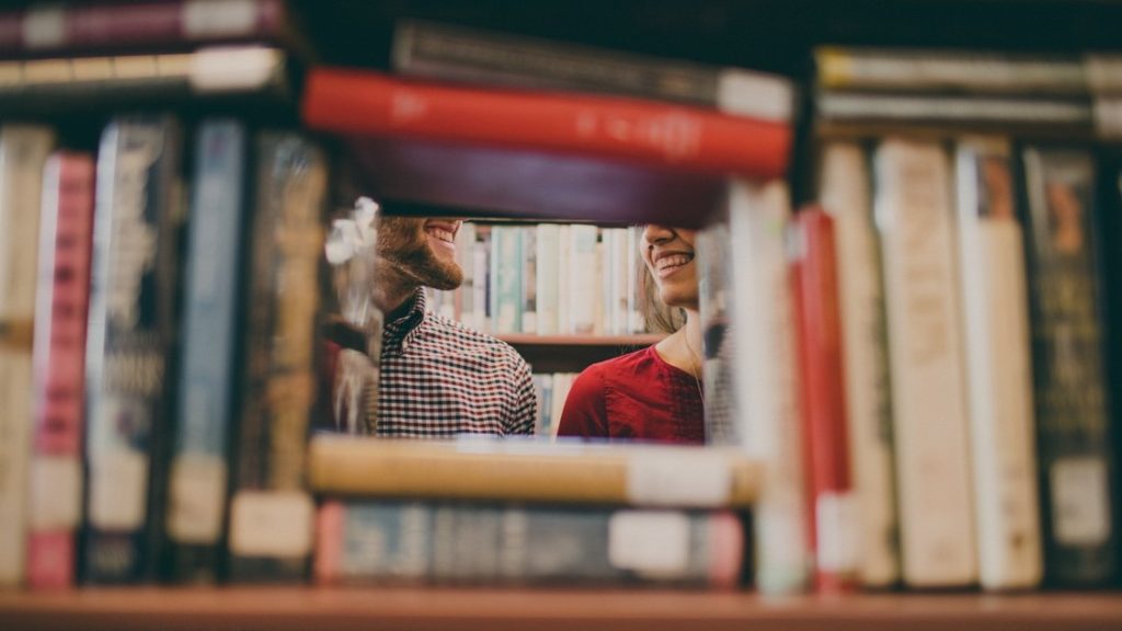 couple photoshoot in a library