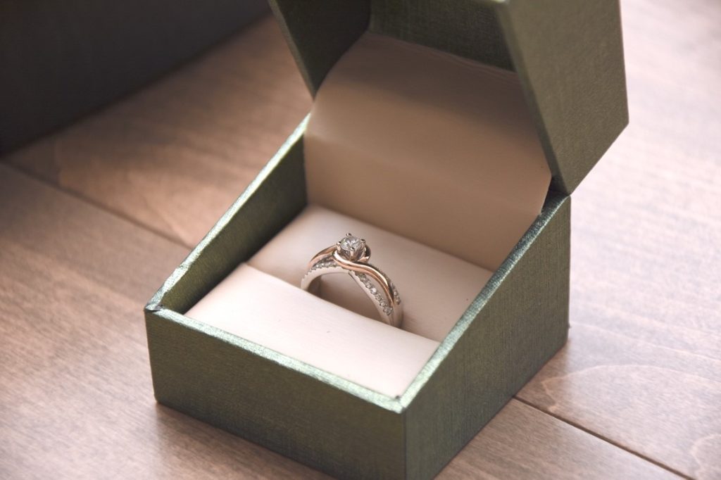 engagement ring in a green box