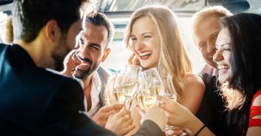 friends holding champagne