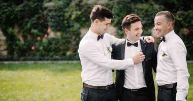 groomsmen and groom