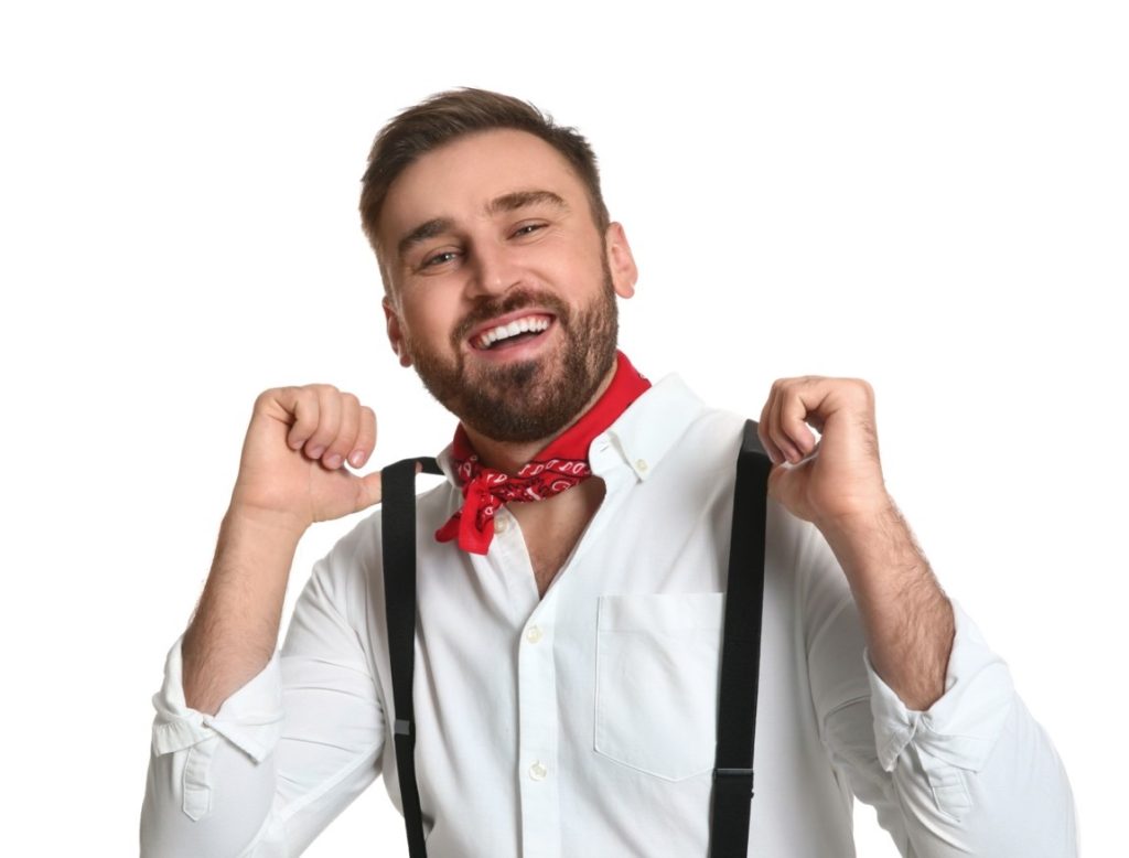 man wearing neckerchief and suspenders