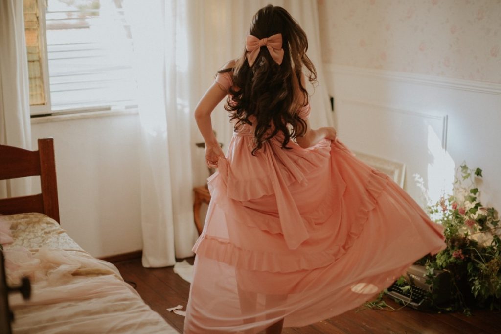 woman dancing in her bedroom