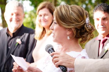 woman giving a speech during a wedding