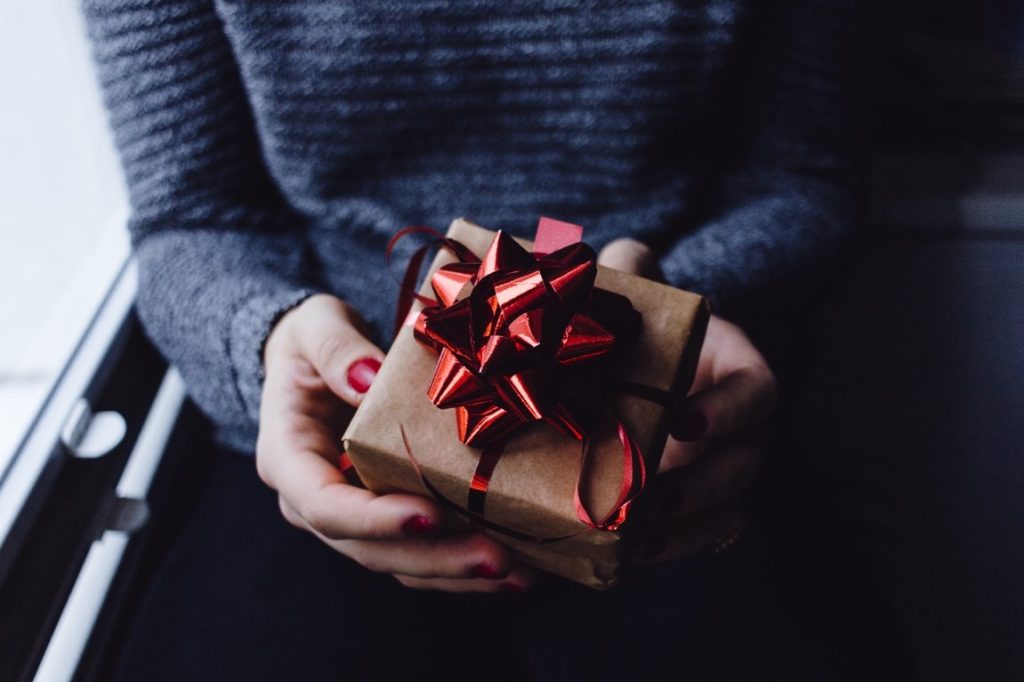 woman holding a present