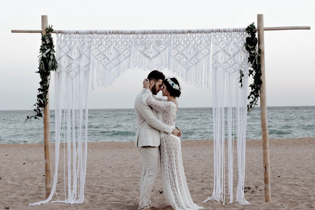 bride and groom holding each other